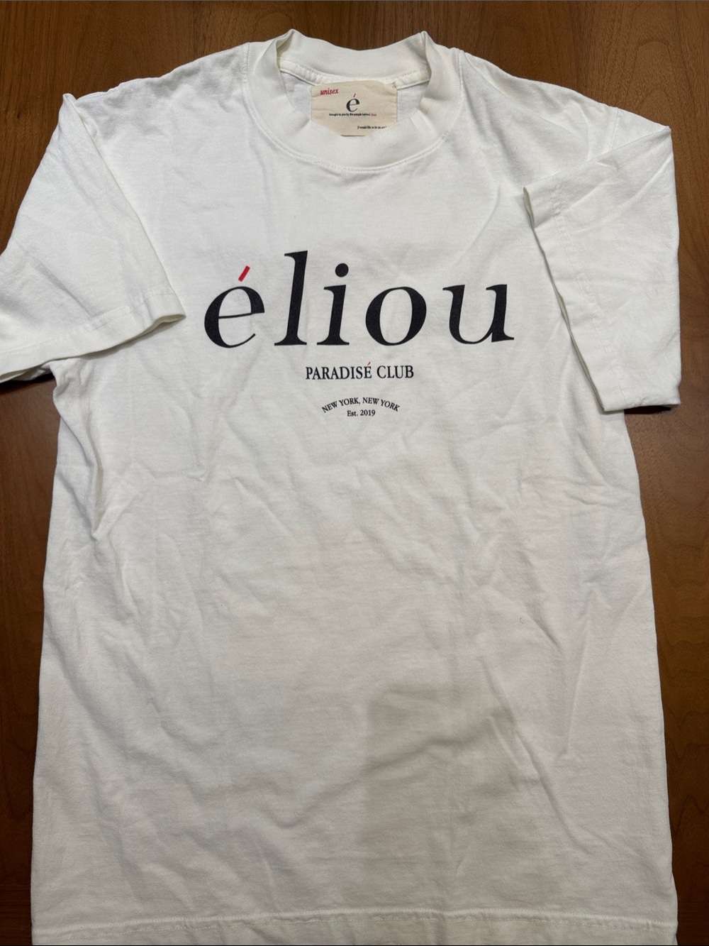 Eliou White Tee with Black Logo and Red Accent